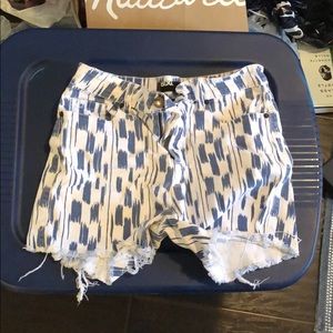 Printed high waist denim shorts.